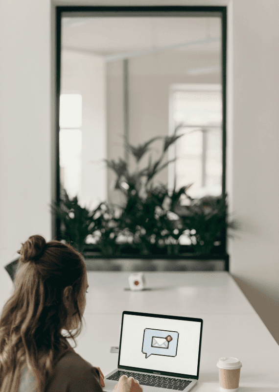 Woman with a mail at the laptop